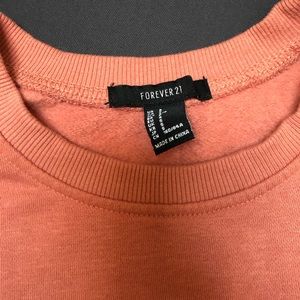 Forever 21 Sweaters - Cropped salmon fleece crew neck Forever 21 Sweaters - Cropped salmon fleece crew neck